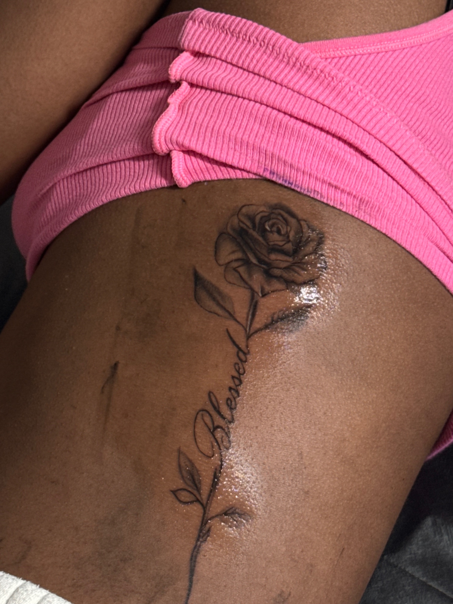 Rose and Blessed script side tattoo